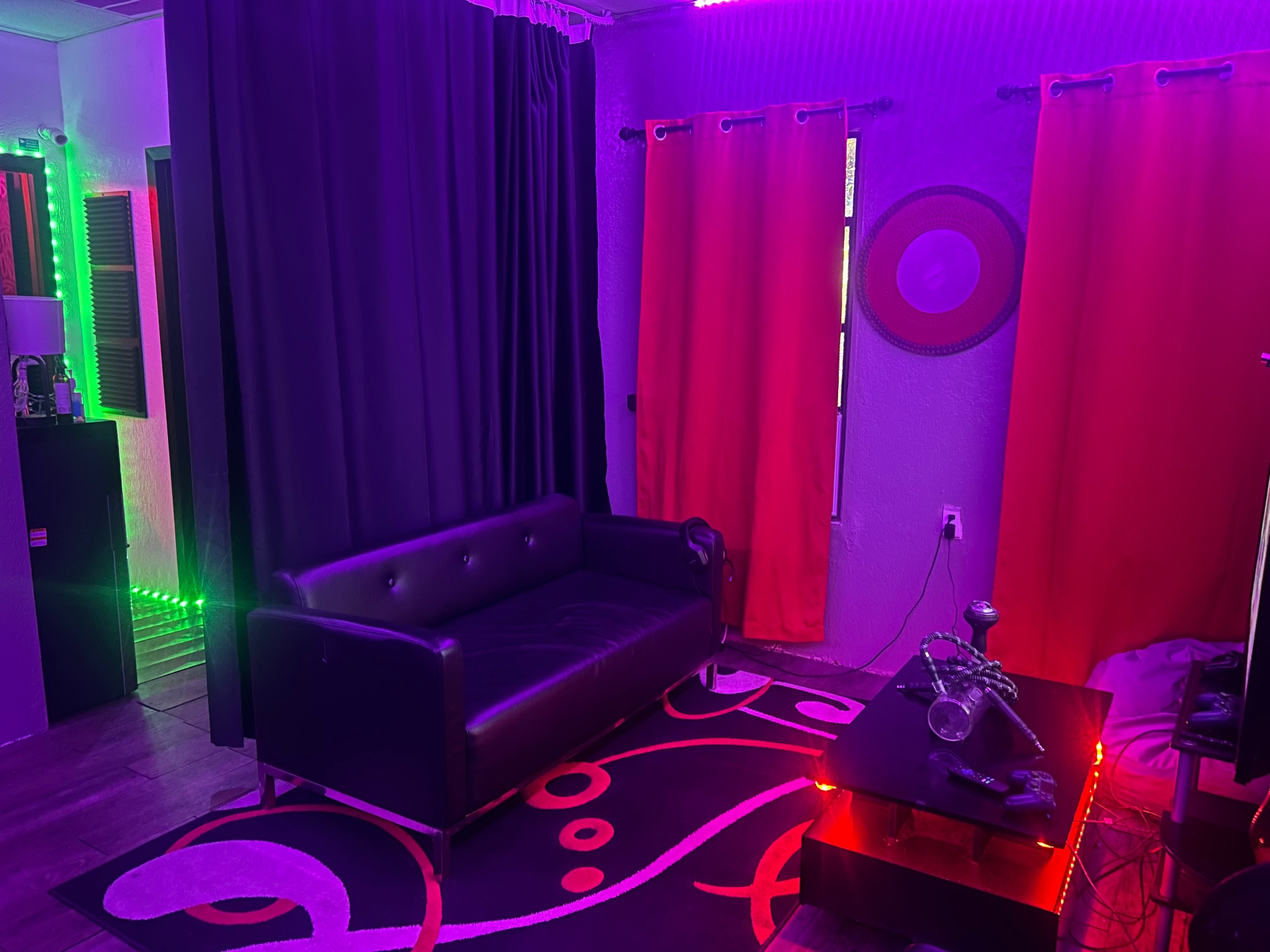 Lounge area with couch and hookah